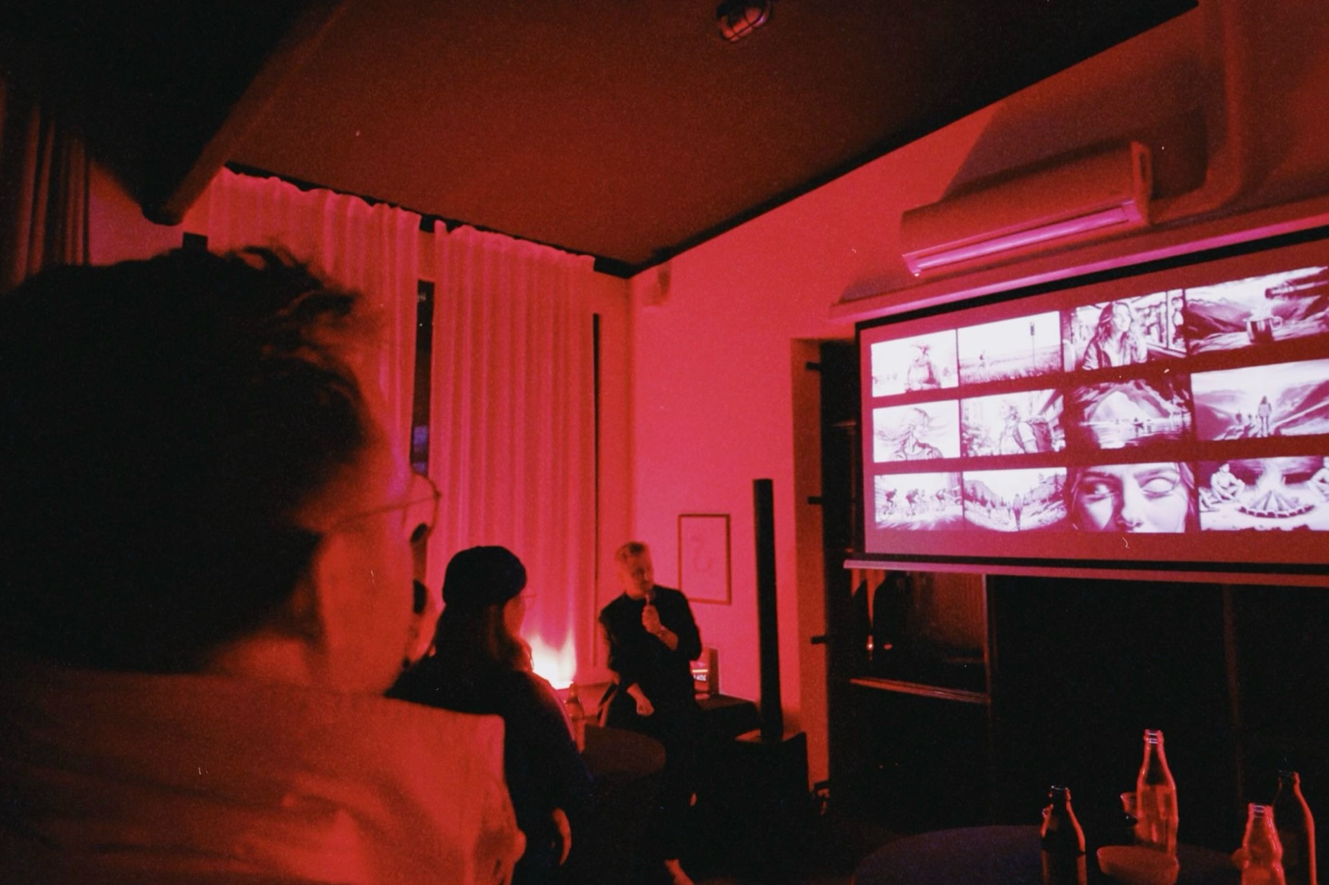 Audience watching a commercial film on the big screen
