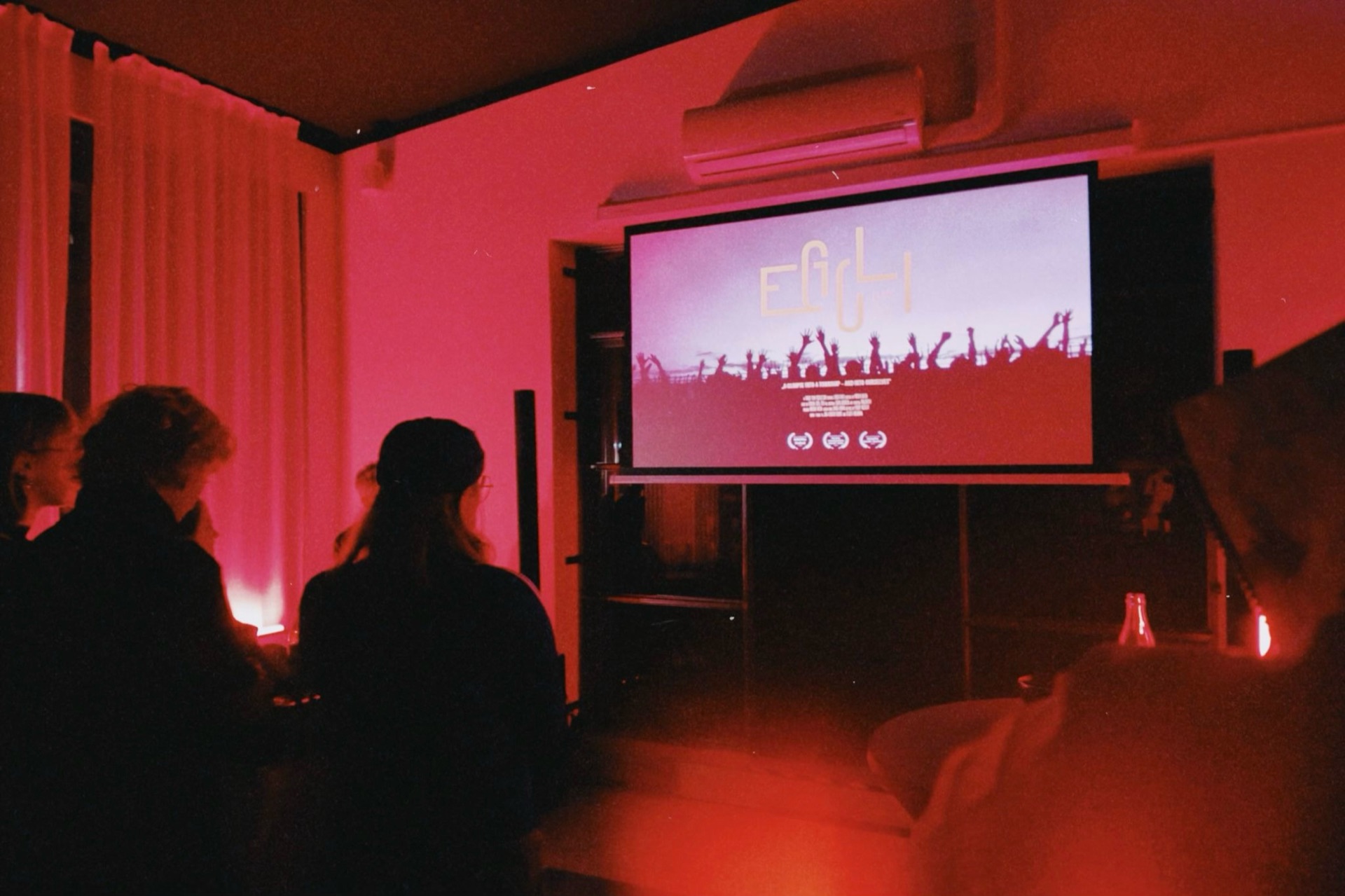 Cinema screen showing a short film